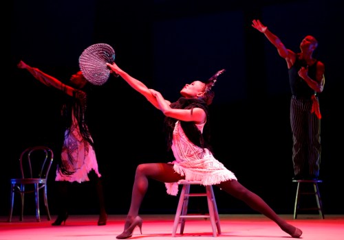 Alvin Ailey American Dance Theater's R. Deshauteurs, R. Robinson and V. Gilmore in Alvin Ailey's Blues Suite. Photo by Paul Kolnik.